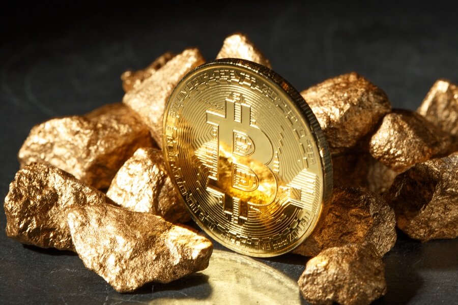 Golden Bitcoin Coin And Mound Of Gold. Bitcoin Cryptocurrency.